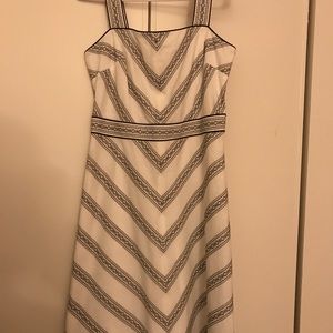 Loft dress. It runs small. It is more of a size 4.